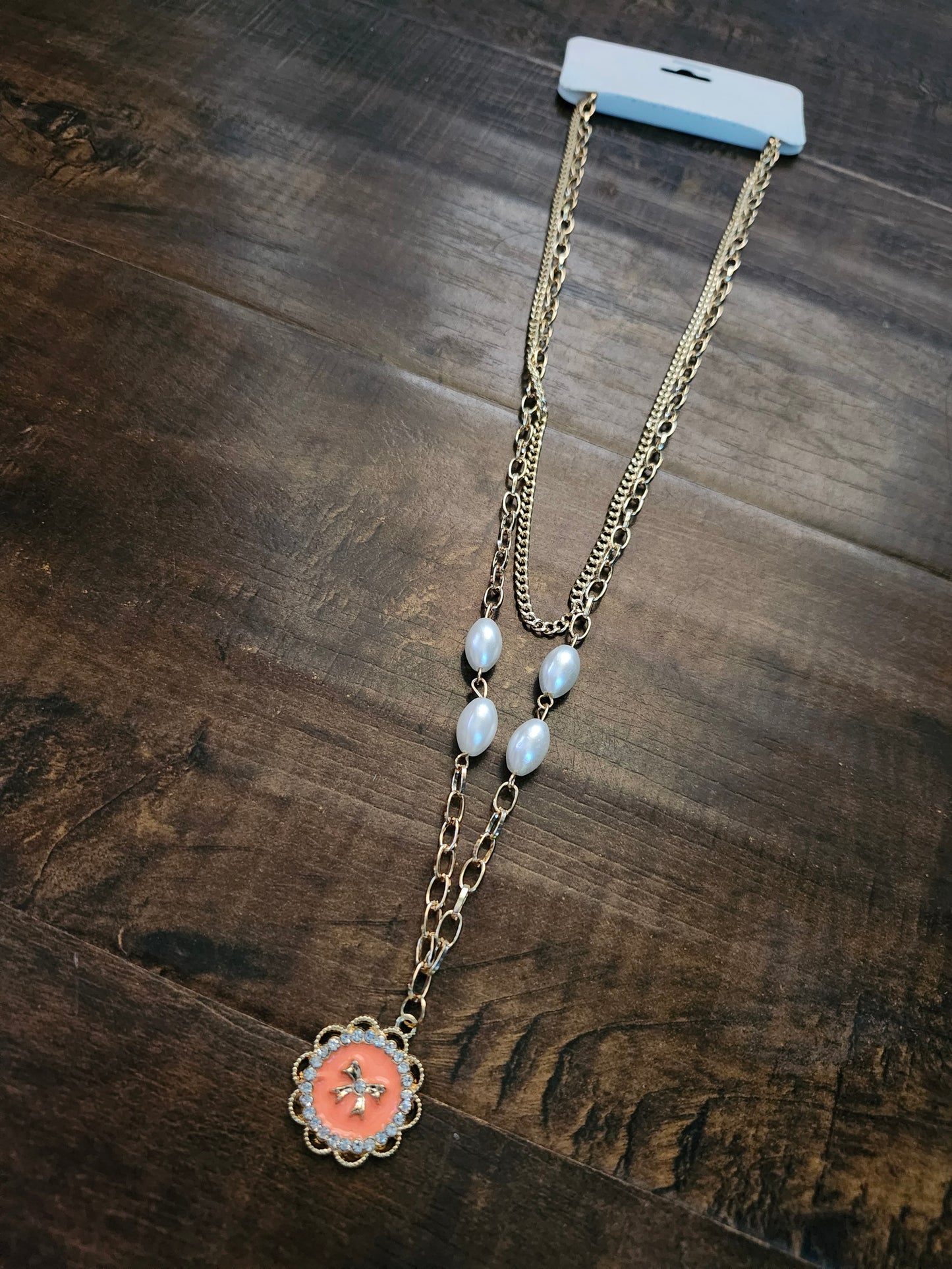 Coral bow necklace