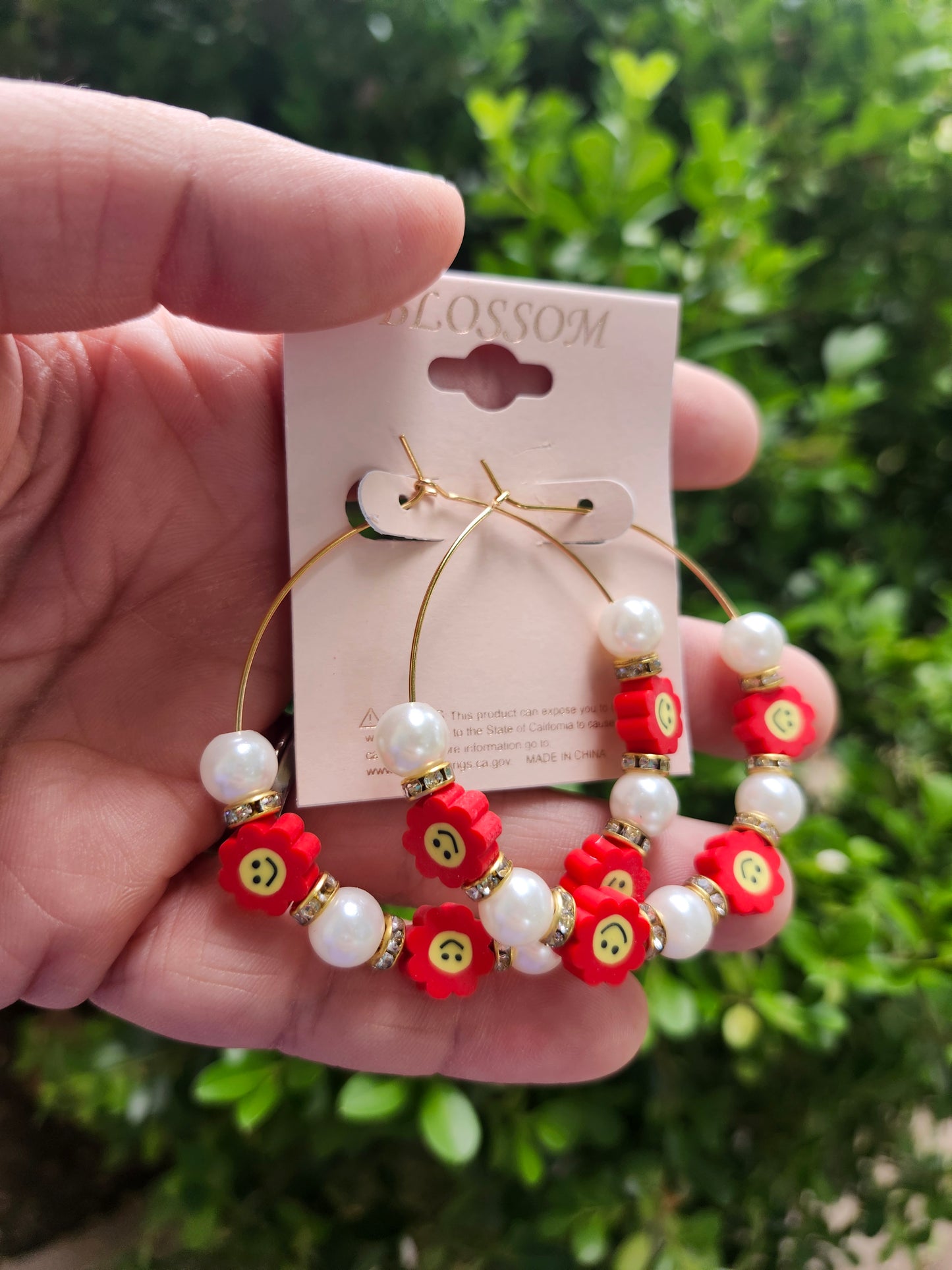 Red smiley flower earrings
