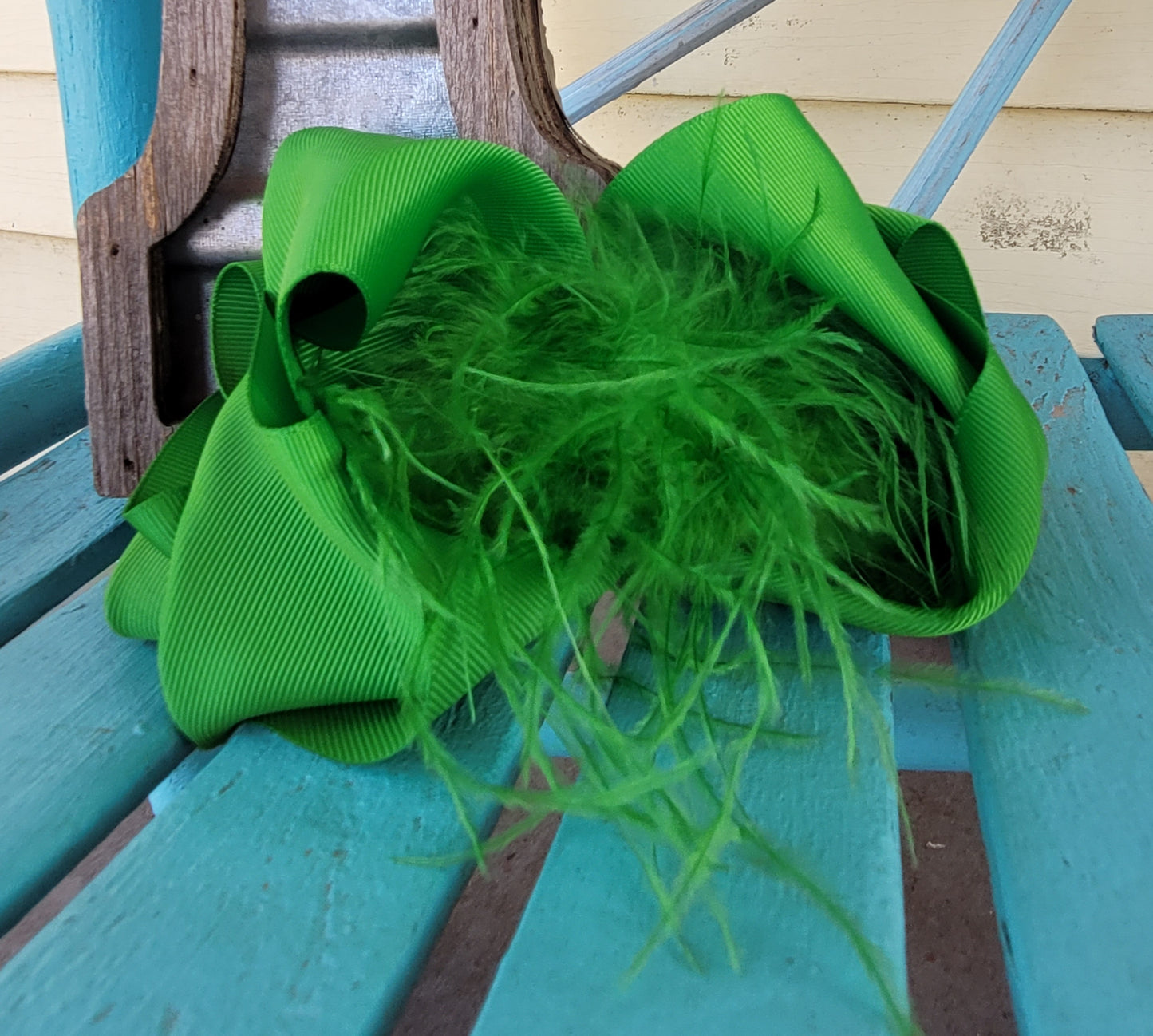 Kelly green feather bow