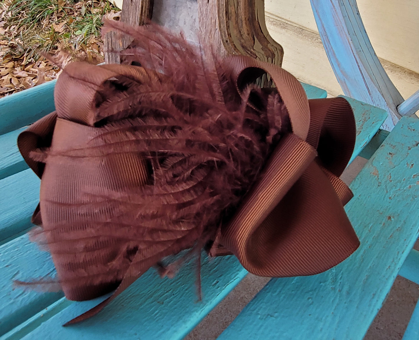 Dark brown feather bow