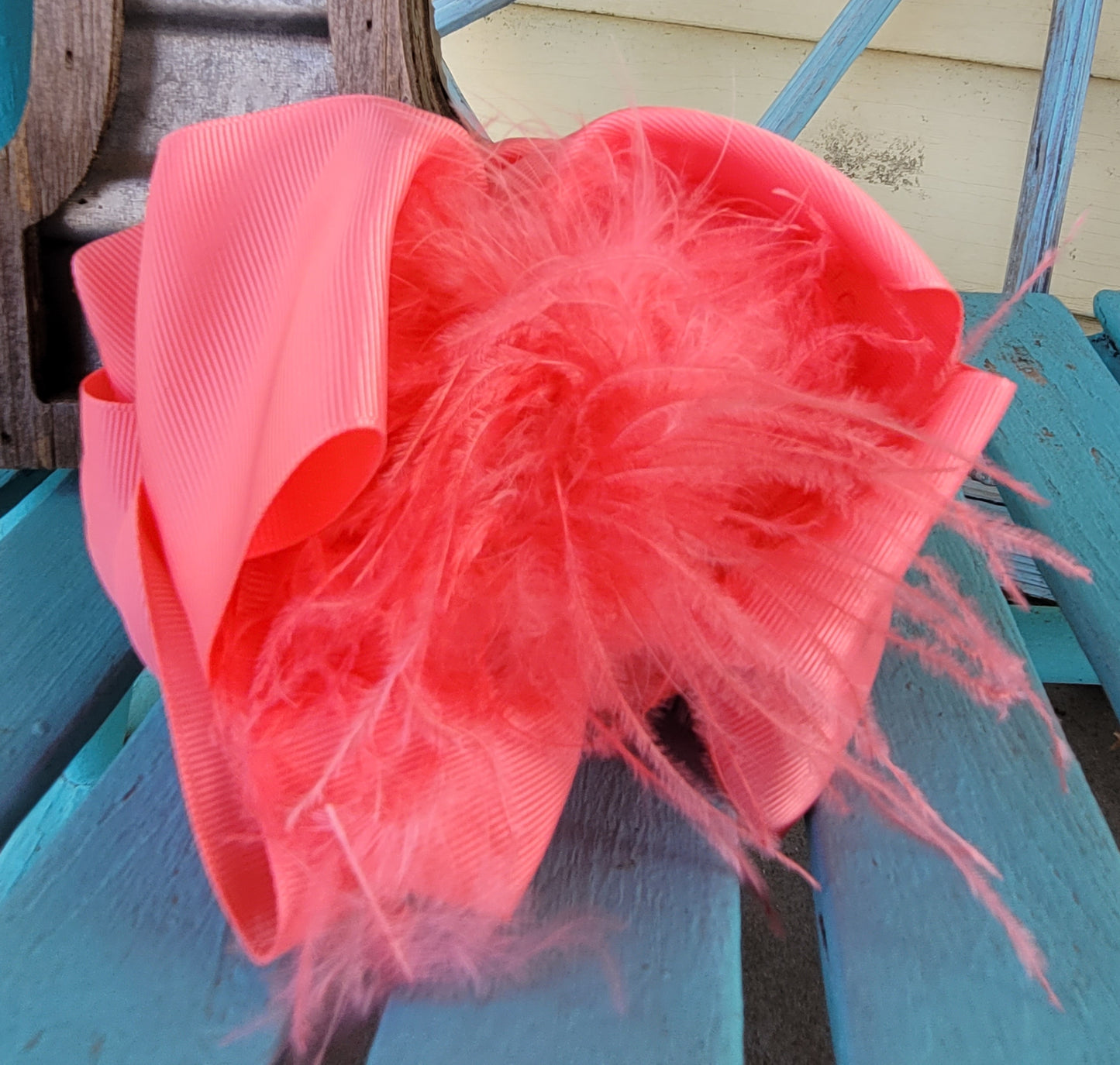 Pink feather bow