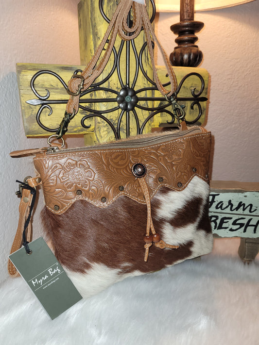 Ornate brown handbag