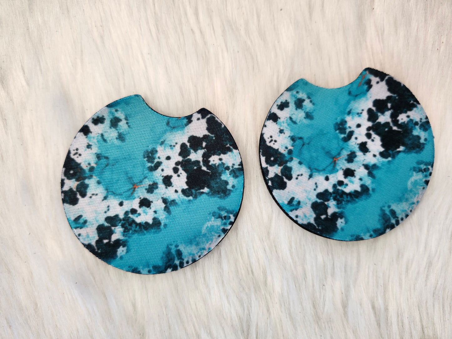 Turquoise cow car coaster