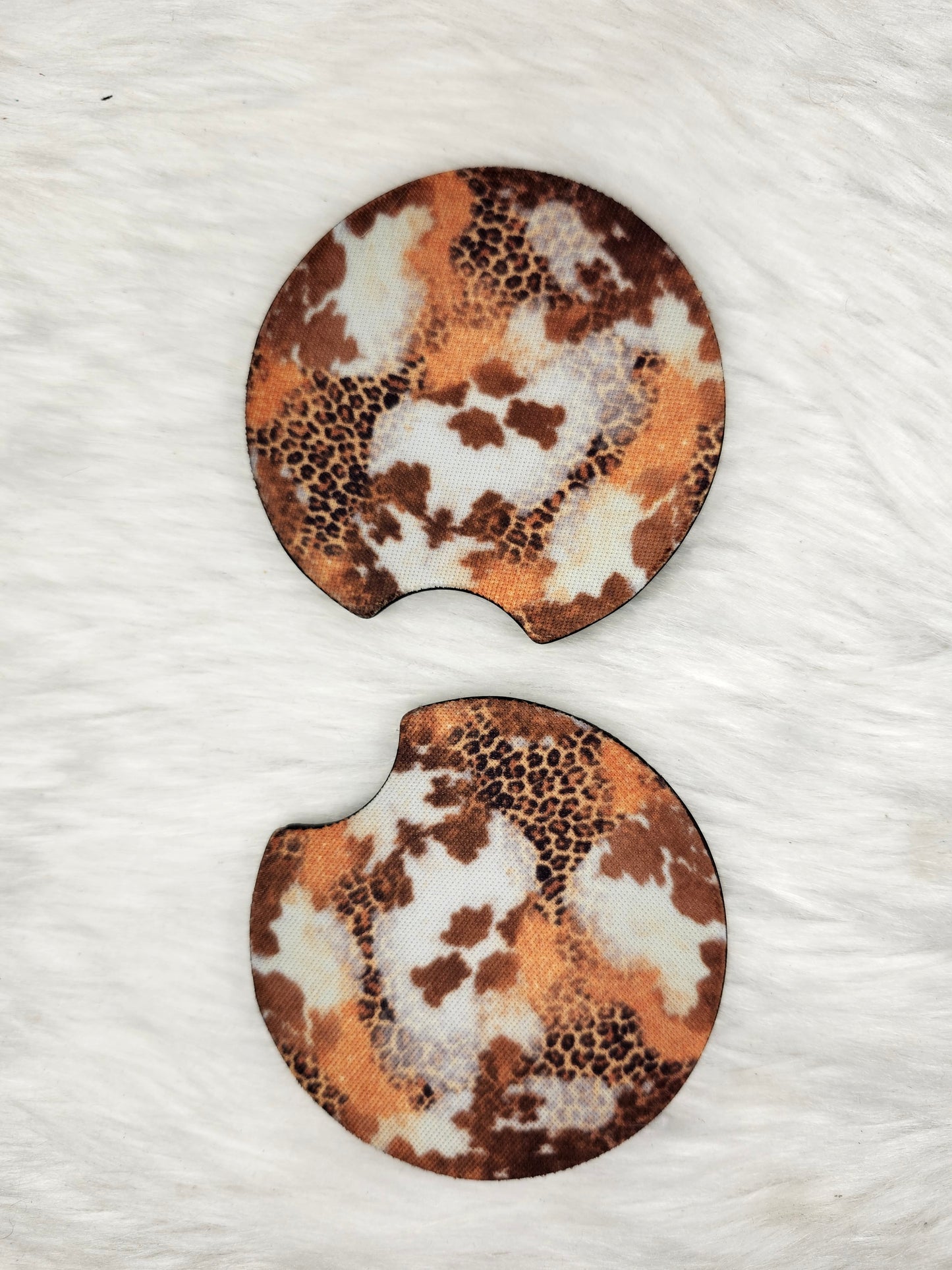 Orange cheetah cow car coaster