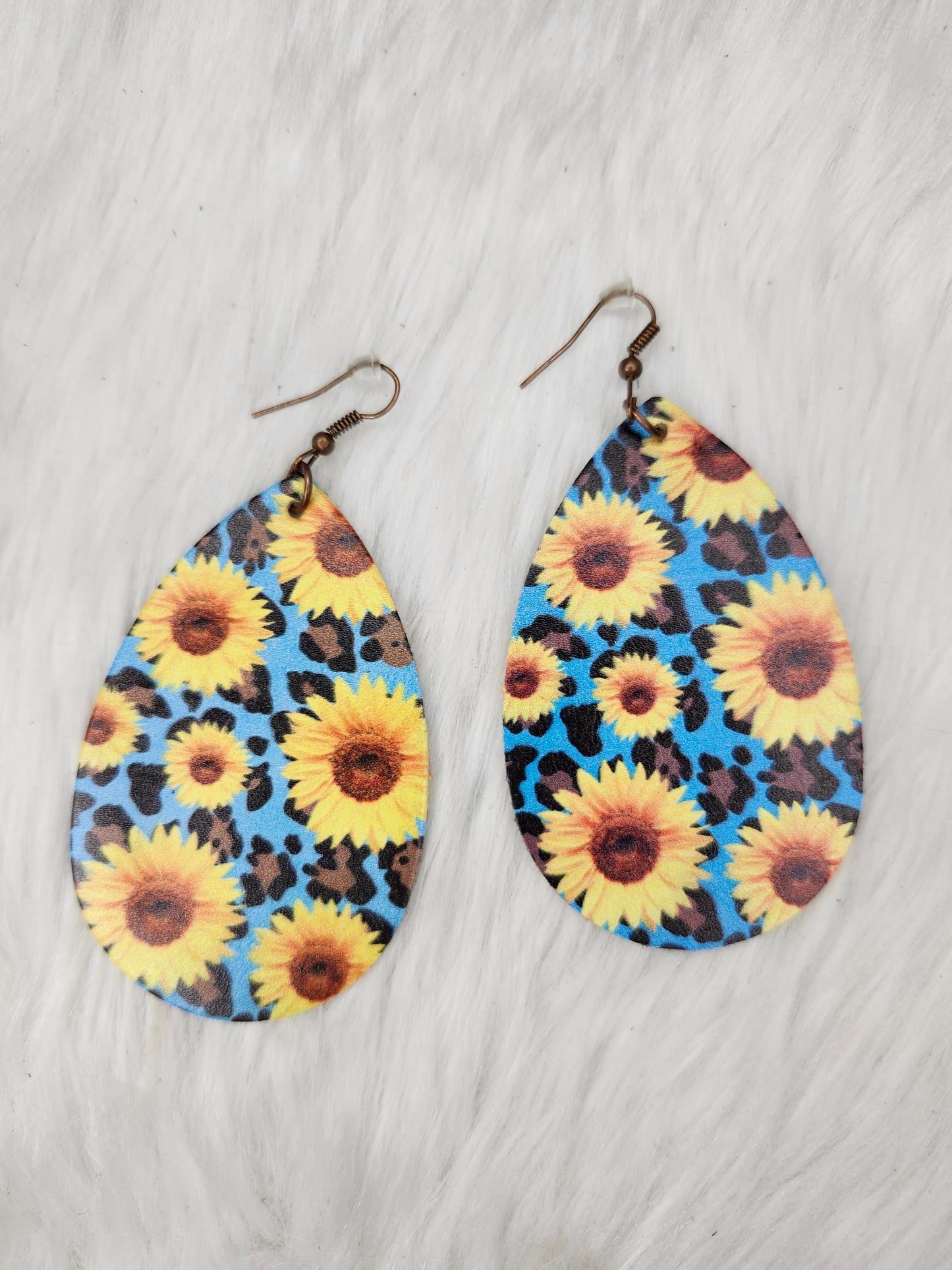 Blue sunflower cheetah earrings