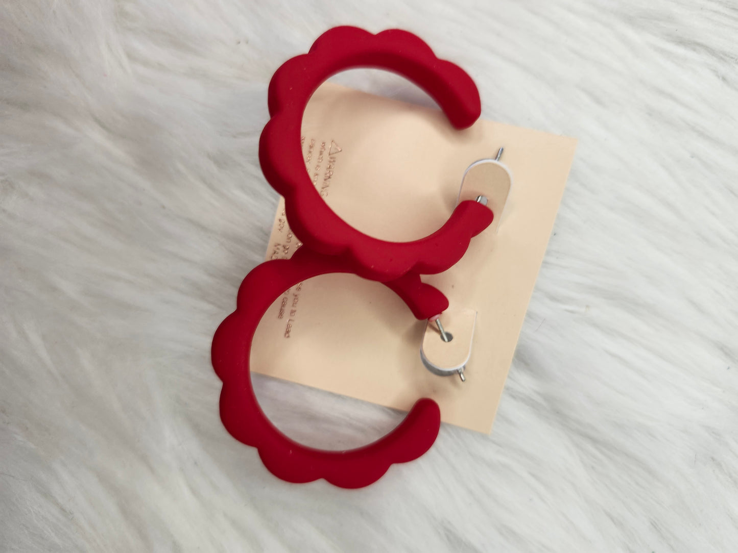 Red hoop earrings