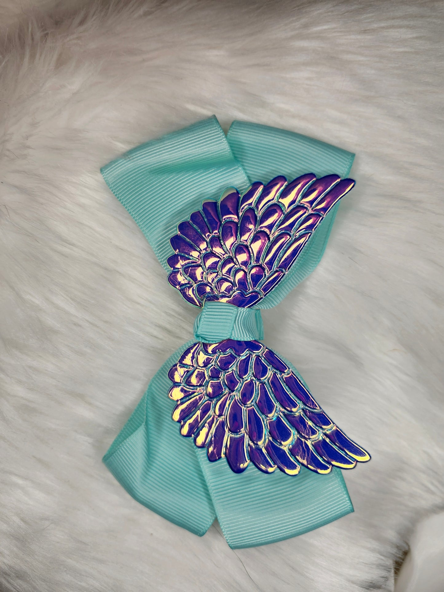 Sky blue wings bow