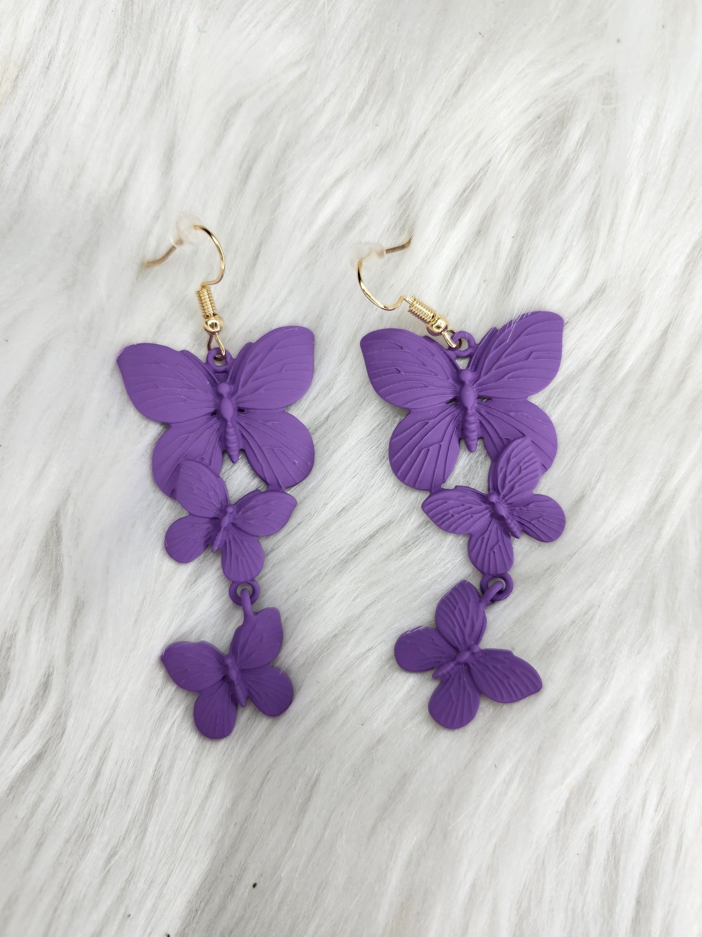 Purple metal butterflies earrings