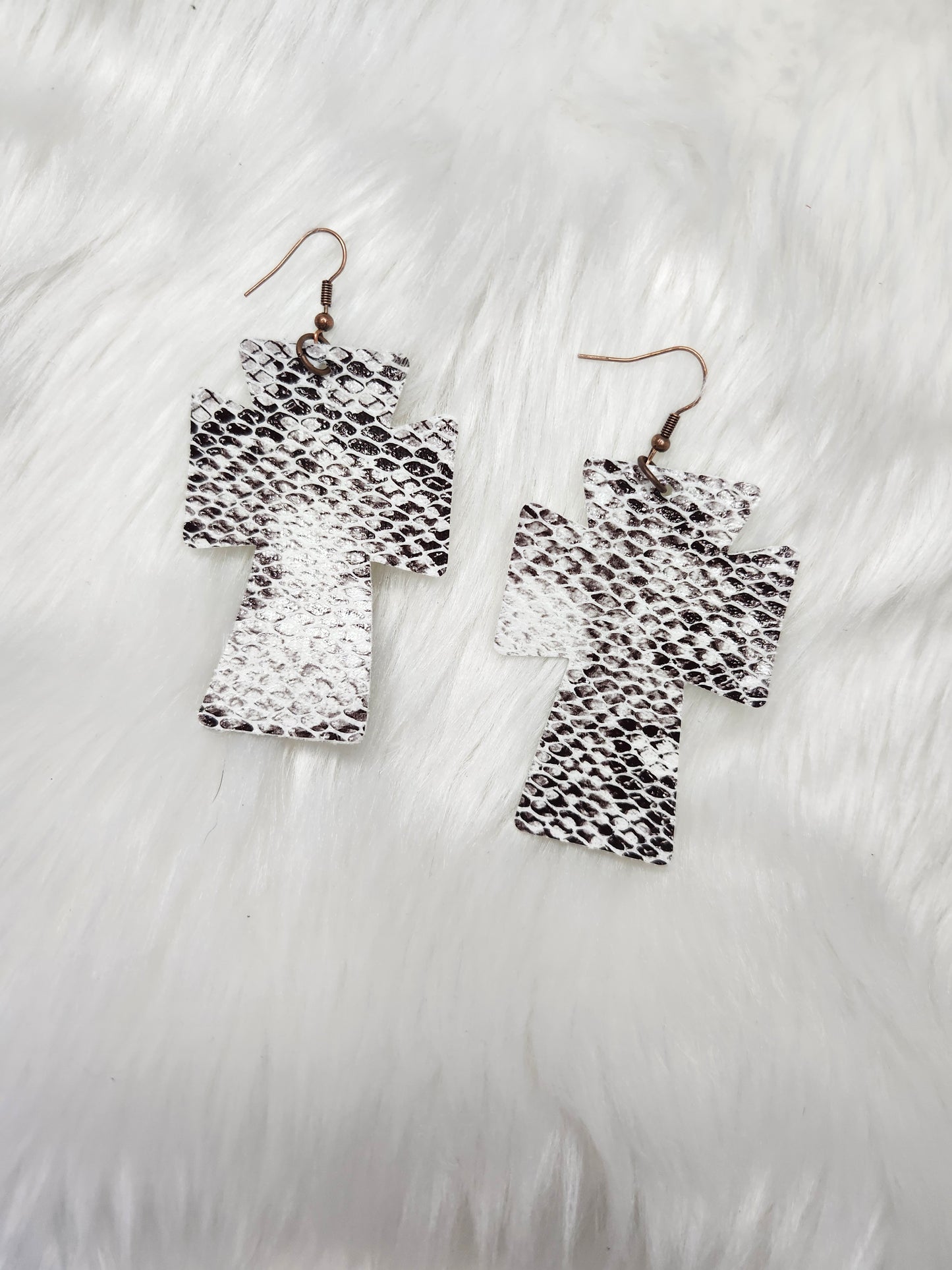 White cross earrings