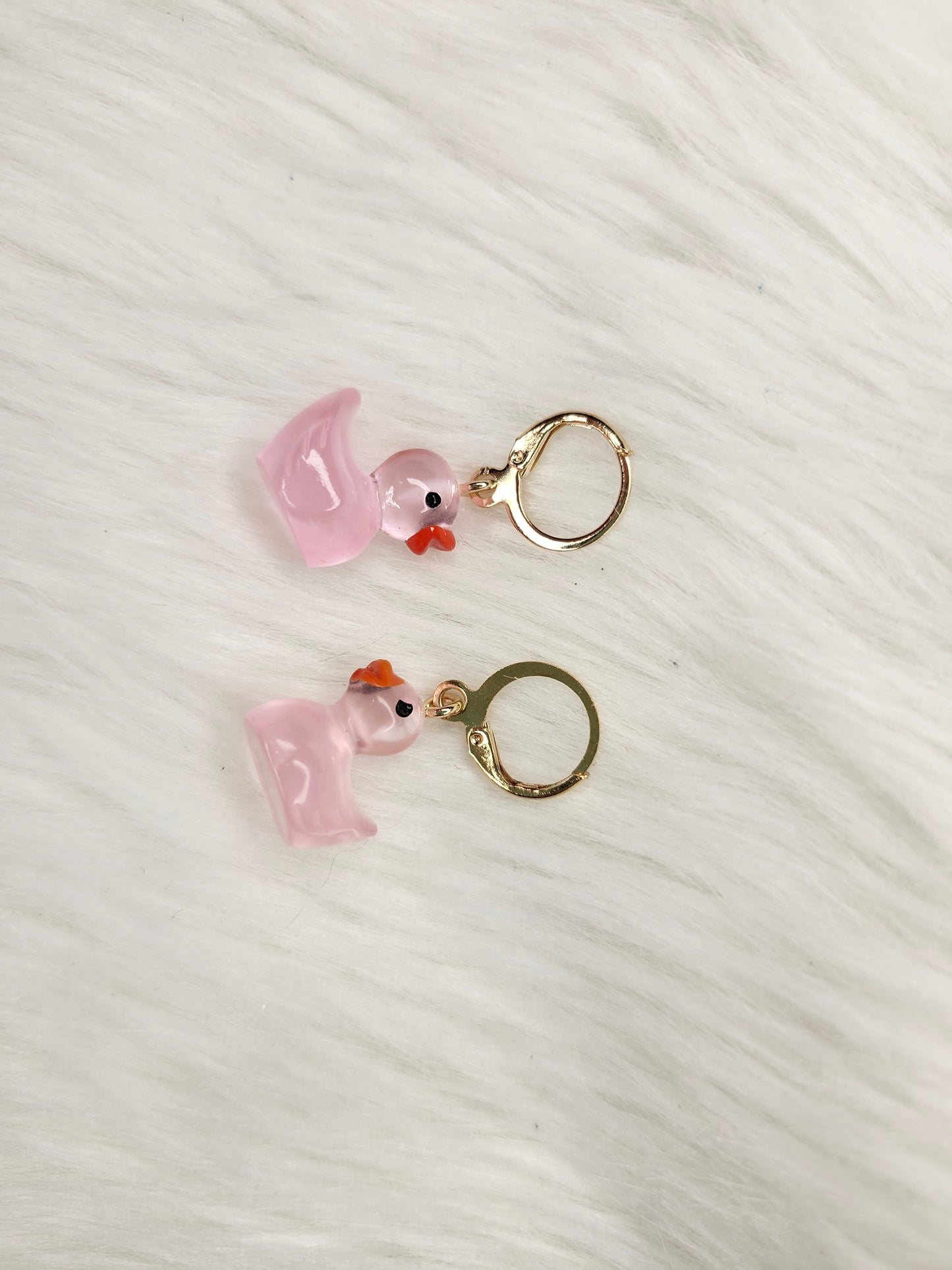 Pink see threw duck earrings