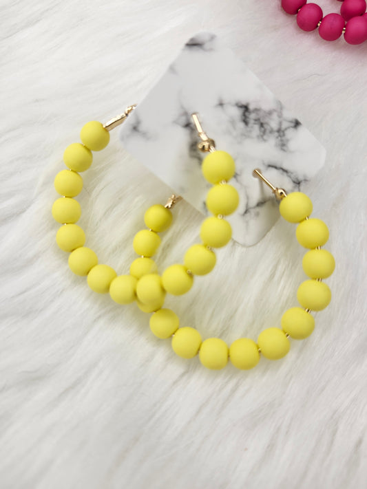 Neon yellow bead hoop earrings