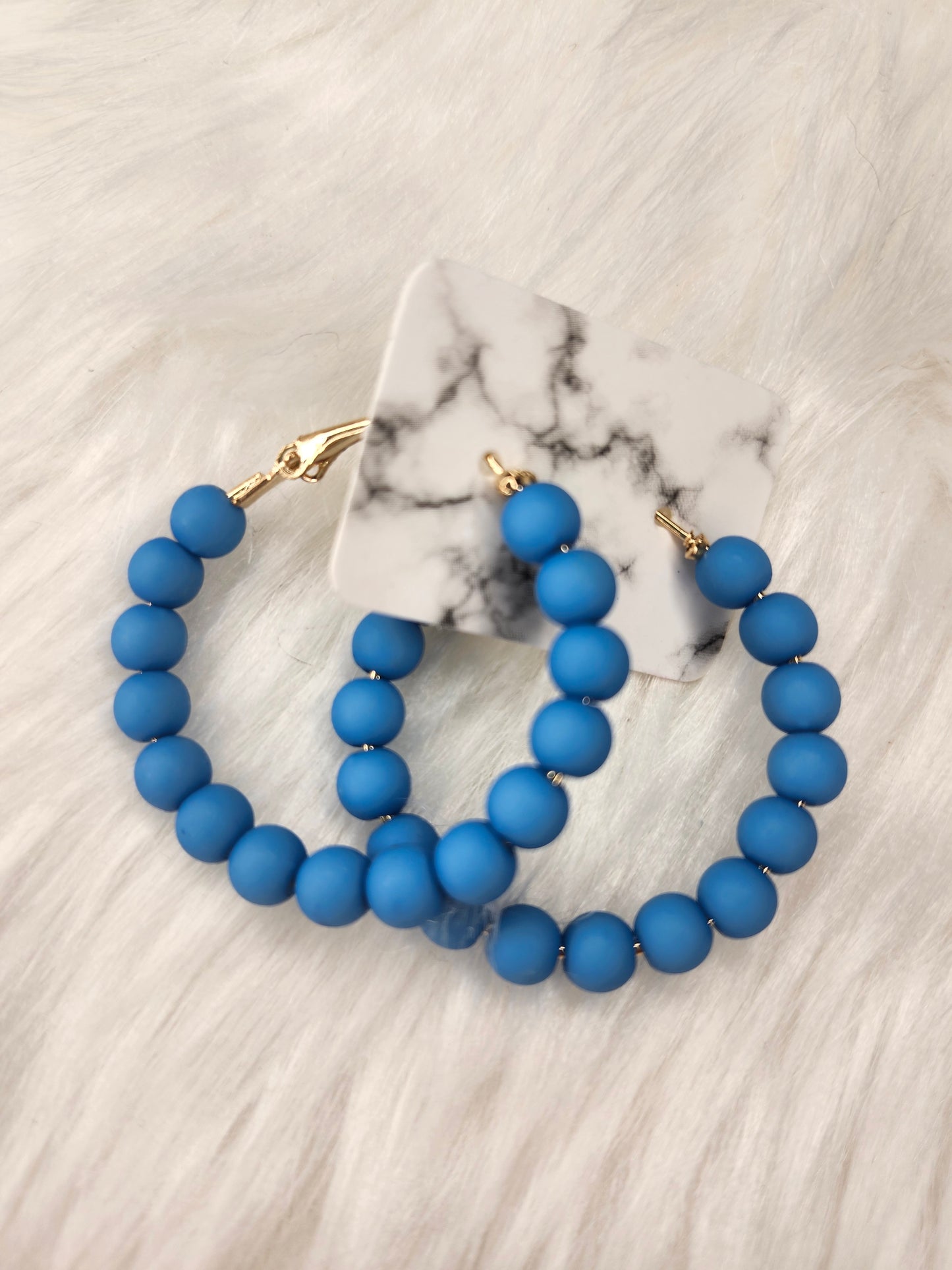 Cloudy blue hoop earrings