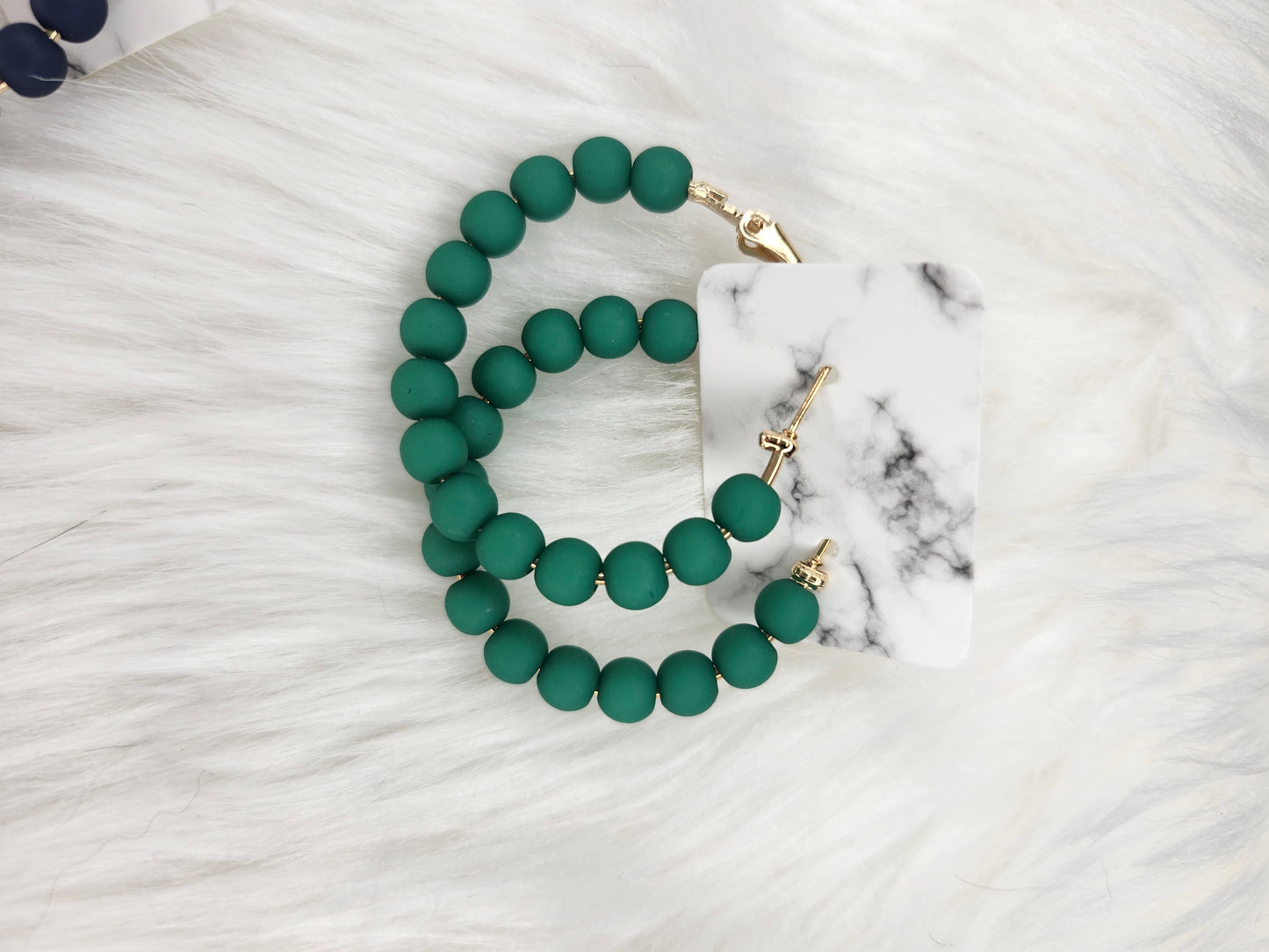 Green hoop earrings