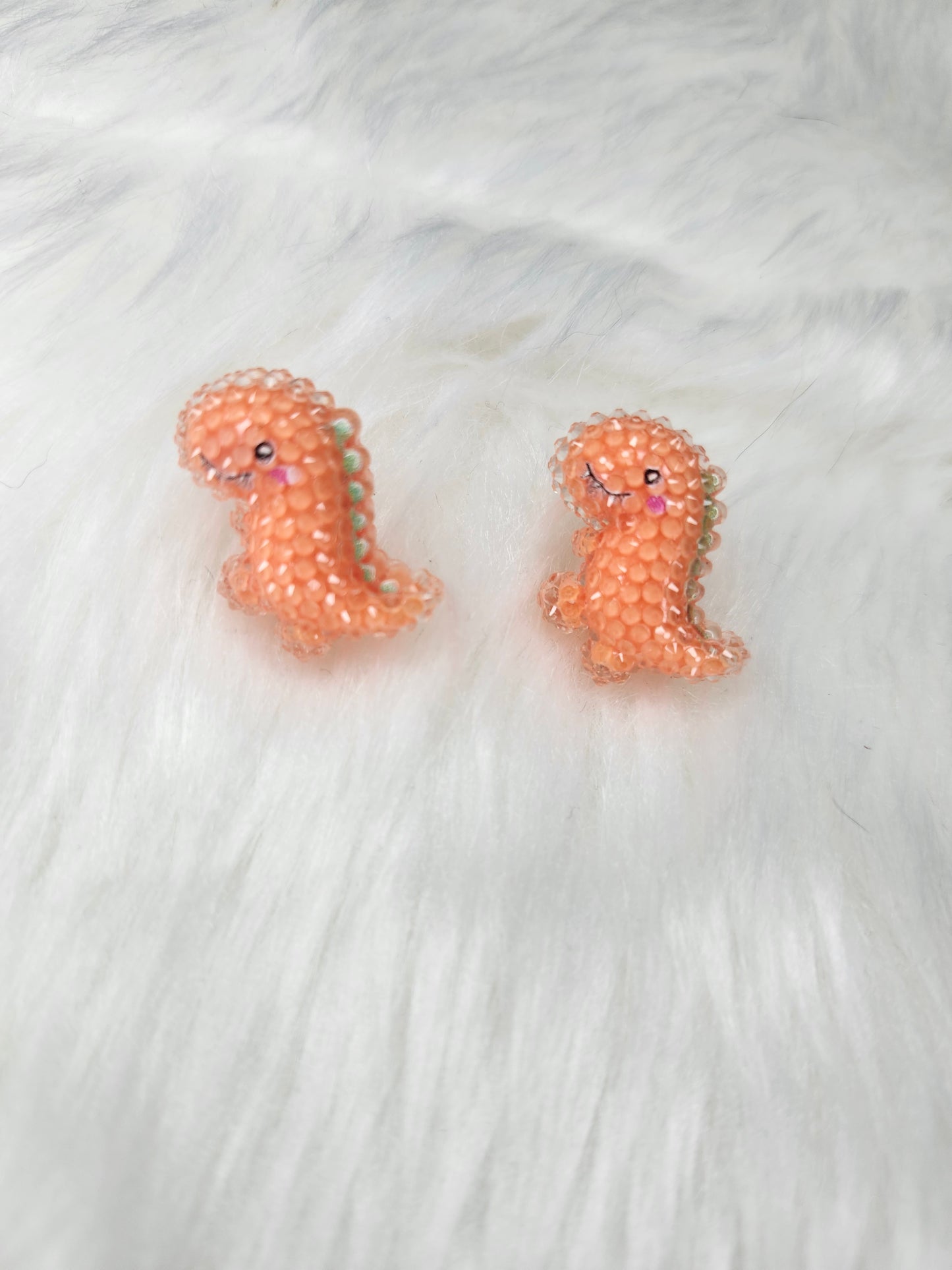 Orange dinosaur earrings