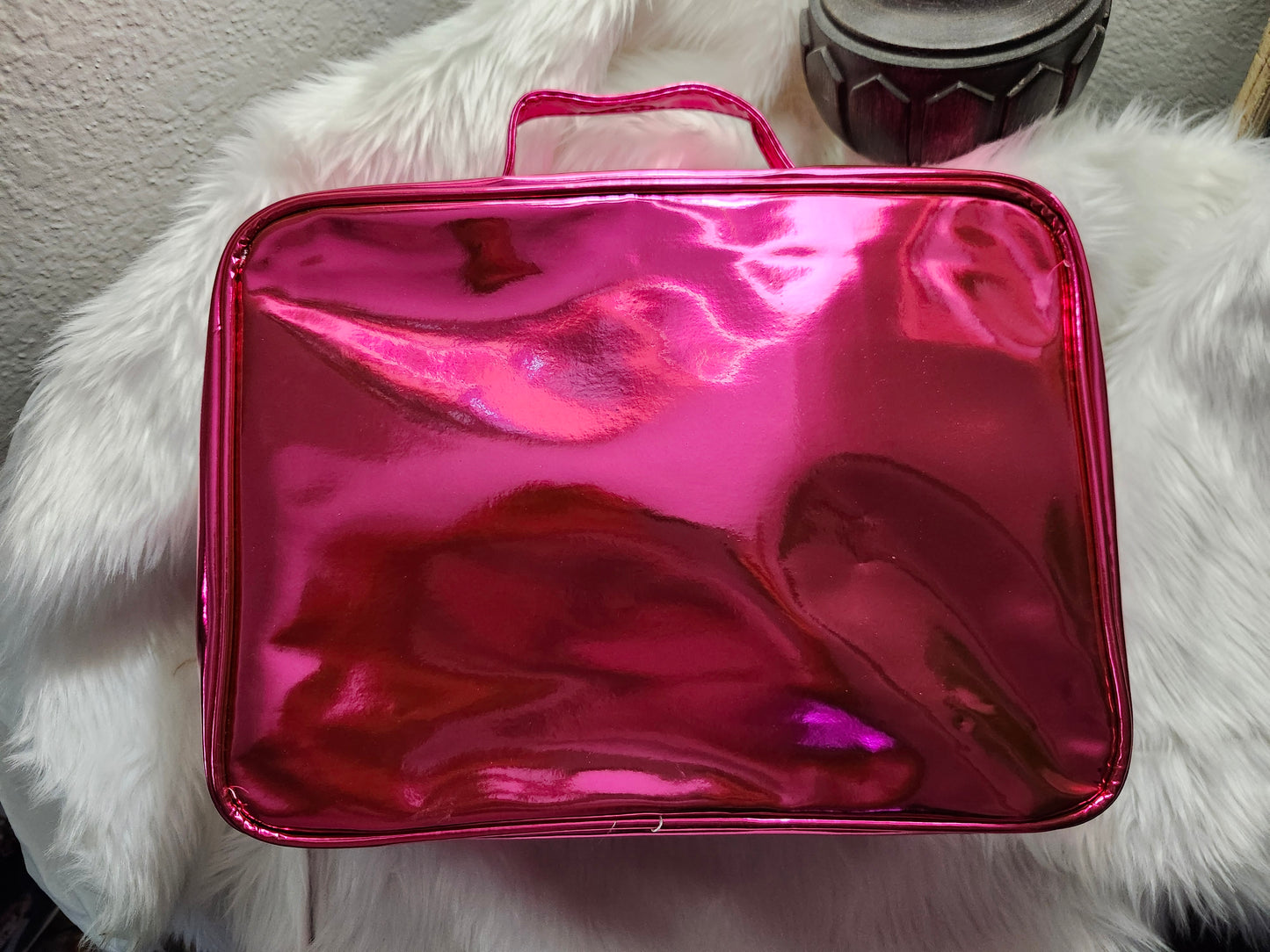 Shiny pink makeup bag