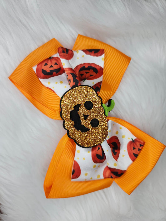 Orange white pumpkin bow