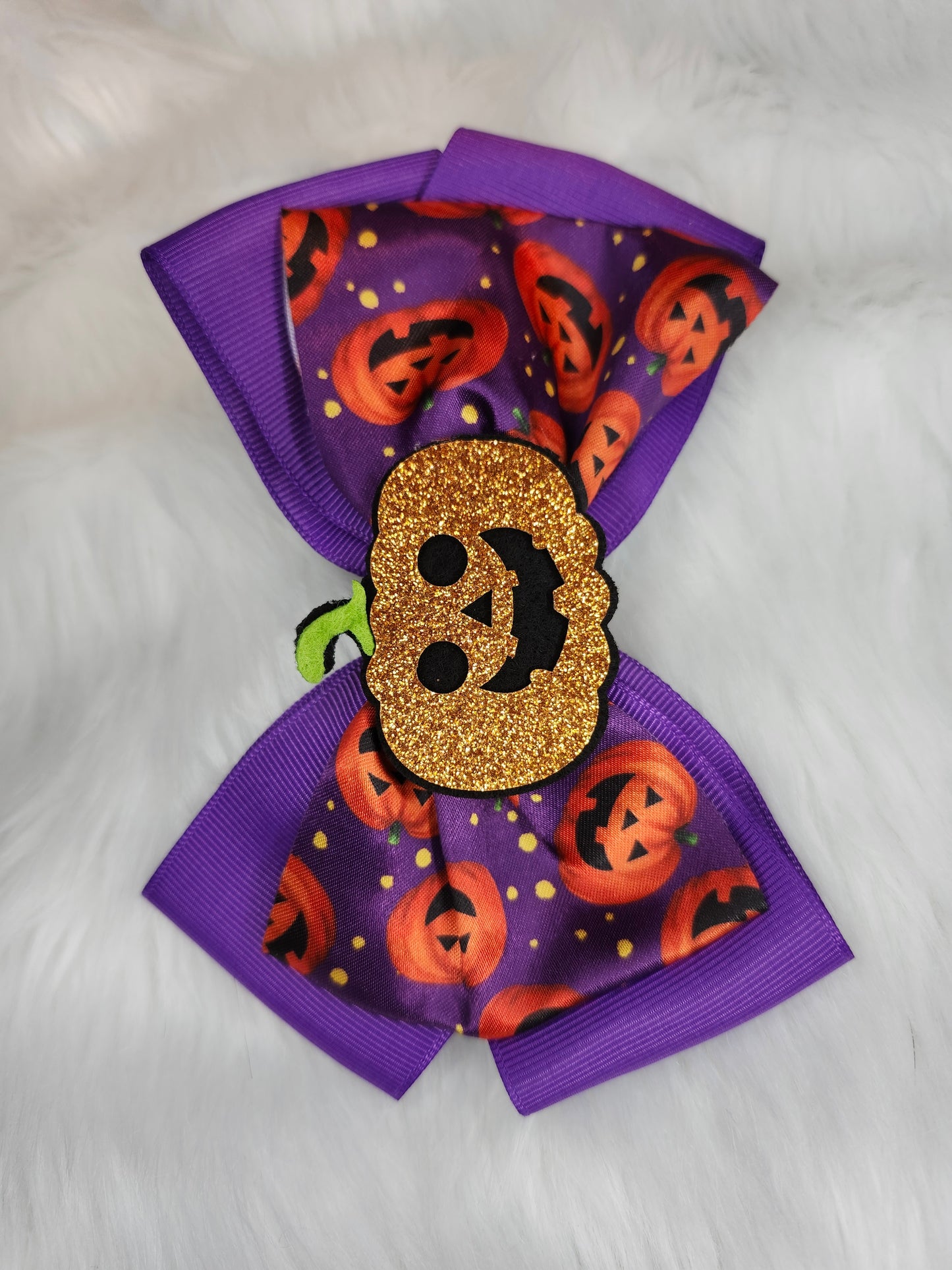 Purple pumpkin bow