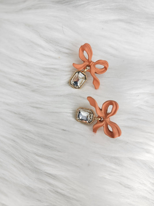 Coral bow earrings