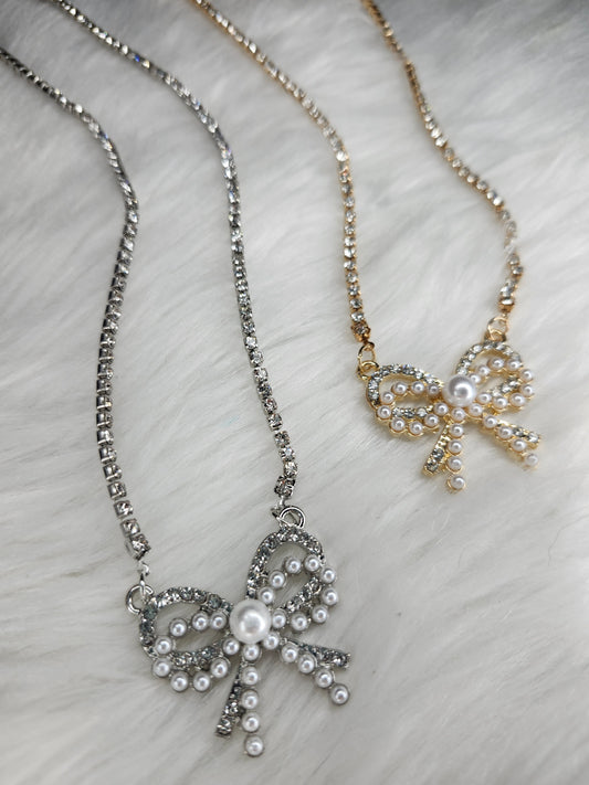 Silver and gold bow necklace