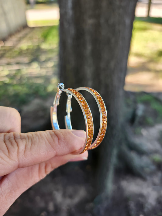 Orange hoop earrings