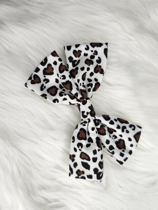 White cheetah piggy bow