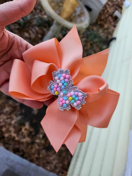 Coral butterfly bow