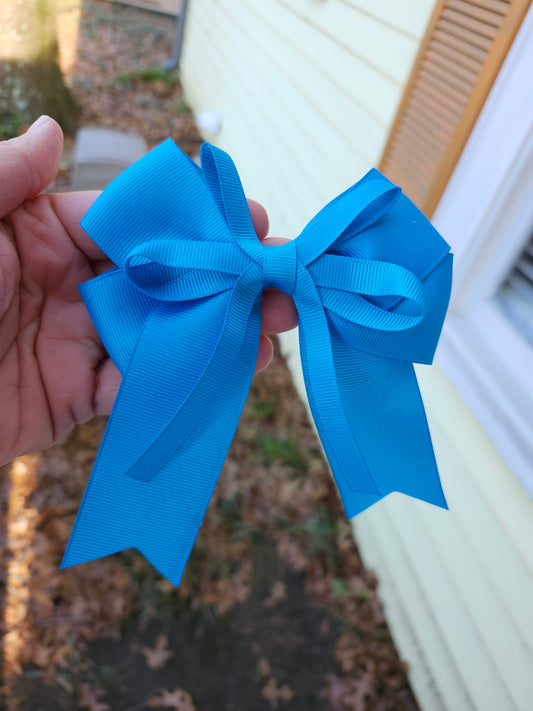 Small blue cheer bow