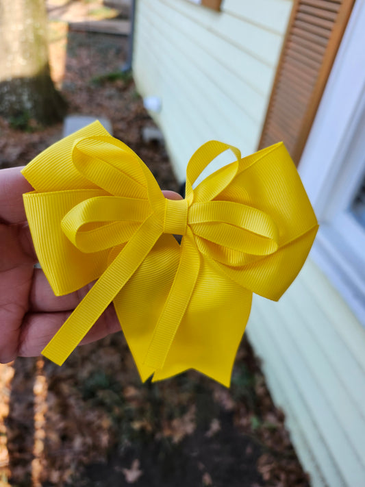 Small yellow cheer bow