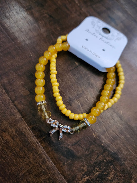 Yellow bow bracelet