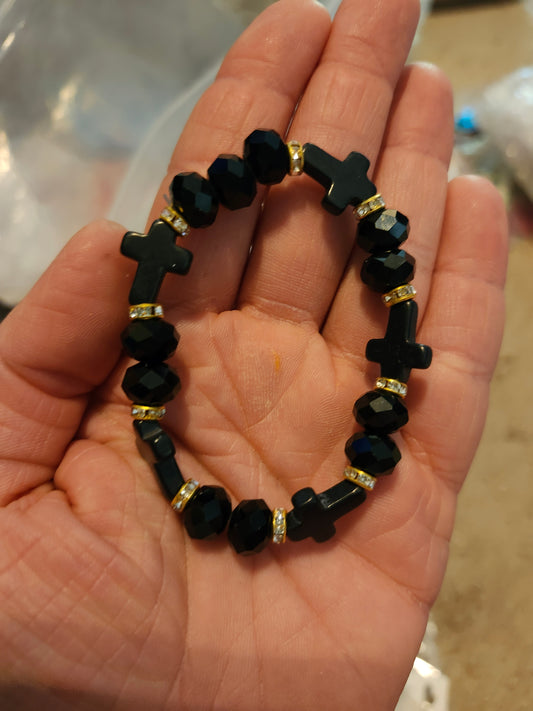 Black bead cross bracelet
