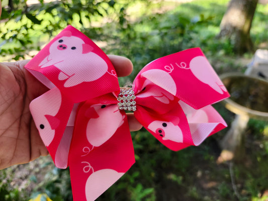 Dark pink pig bow