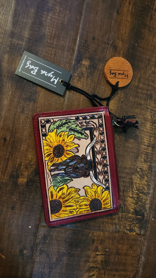 Where Longhorns graze myra wallet