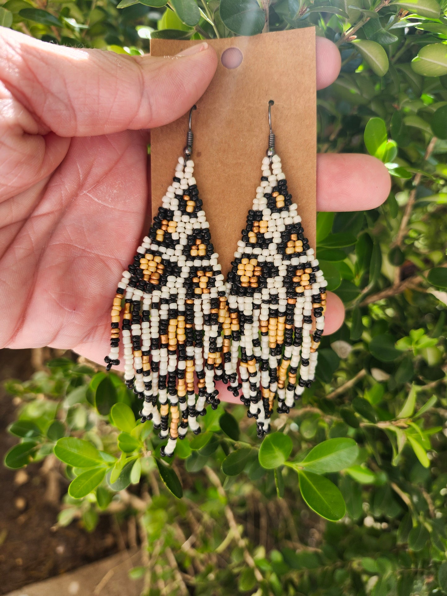 Sea bead cheetah earrings