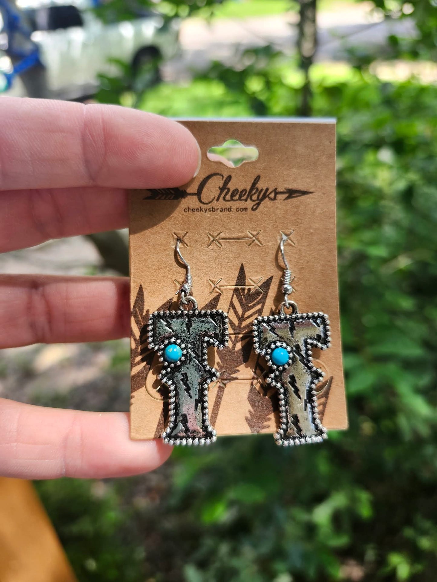 T earrings