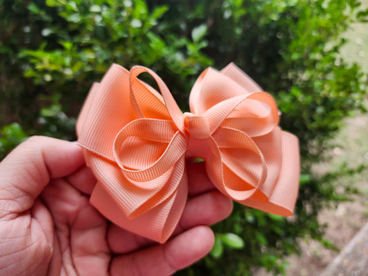 Coral triple bow