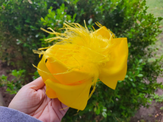 Yellow feather bows