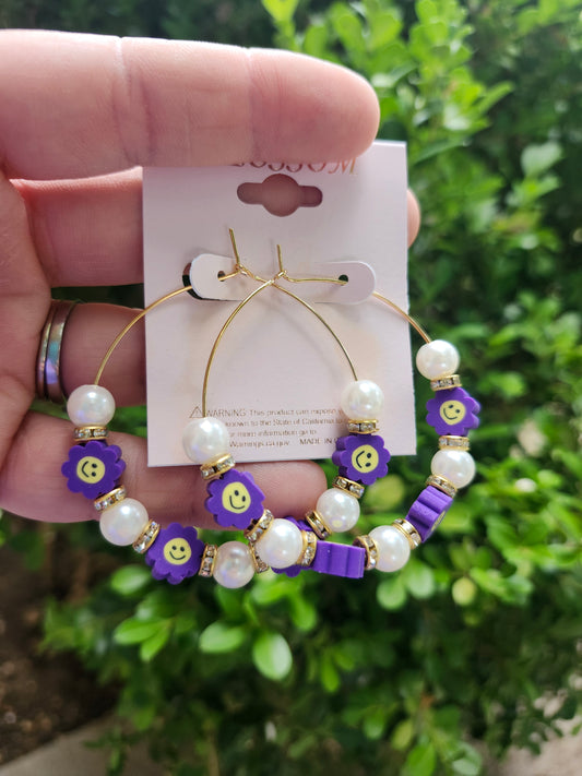 Purple smiley flower earrings