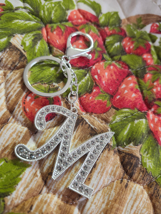 M keychain