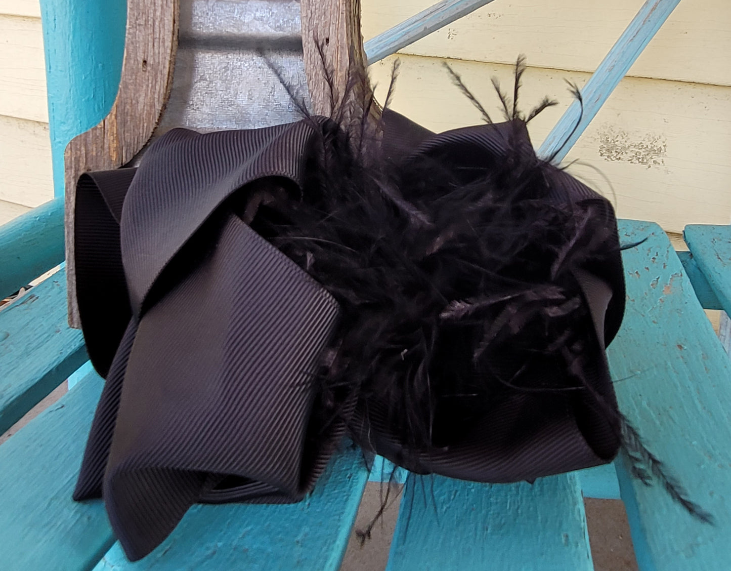 Black feather bow