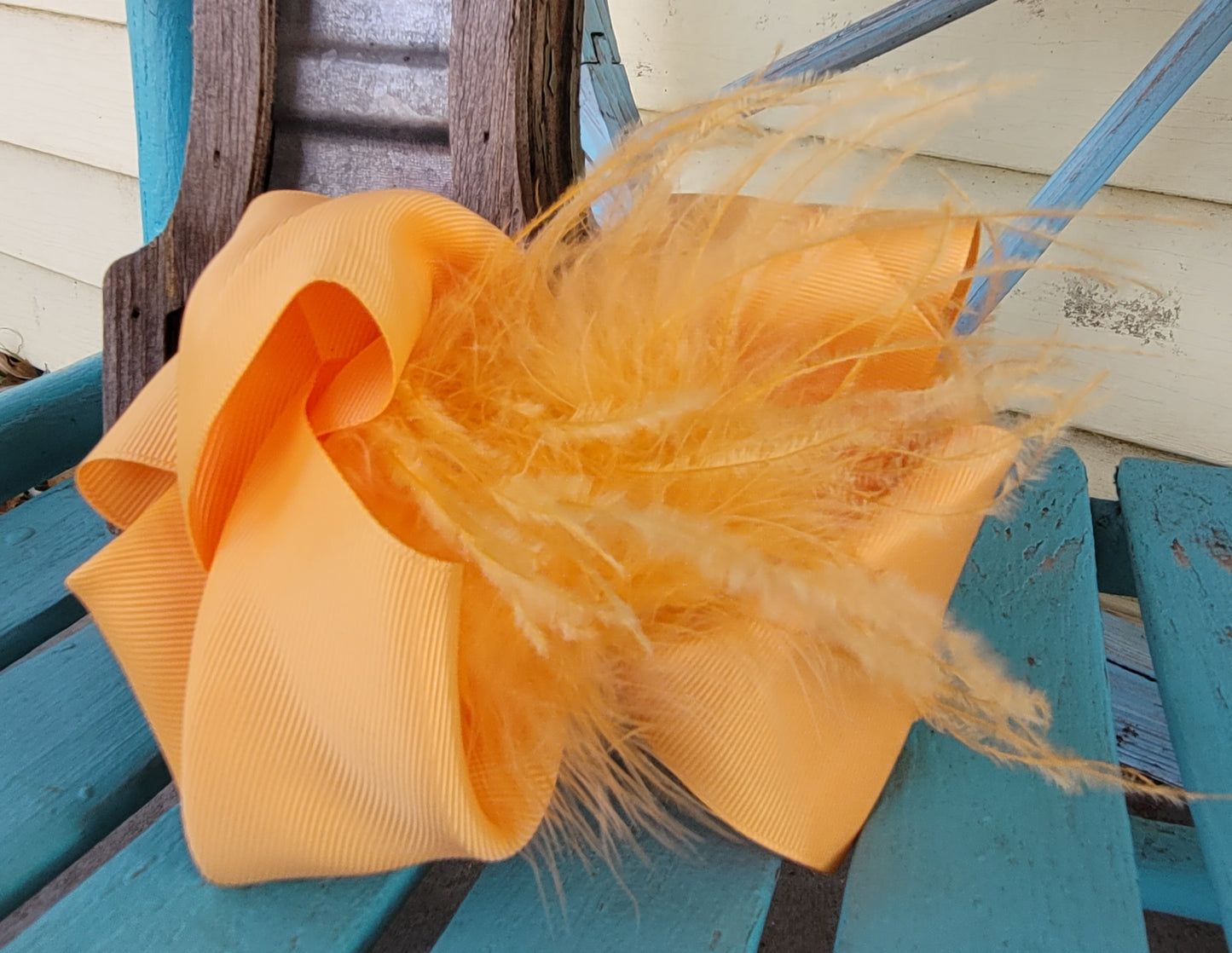 Peach feather bow