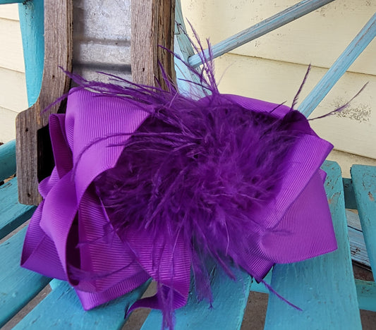 Purple feather bow