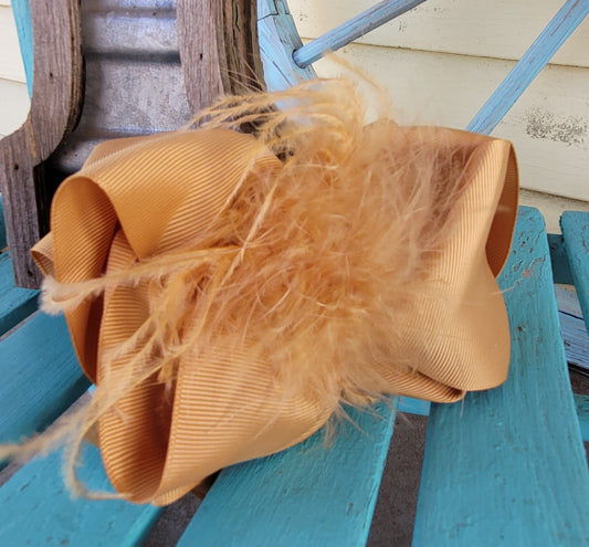 Tan feather bow