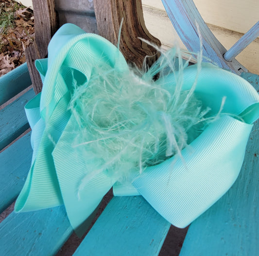 Light turquoise feather bow