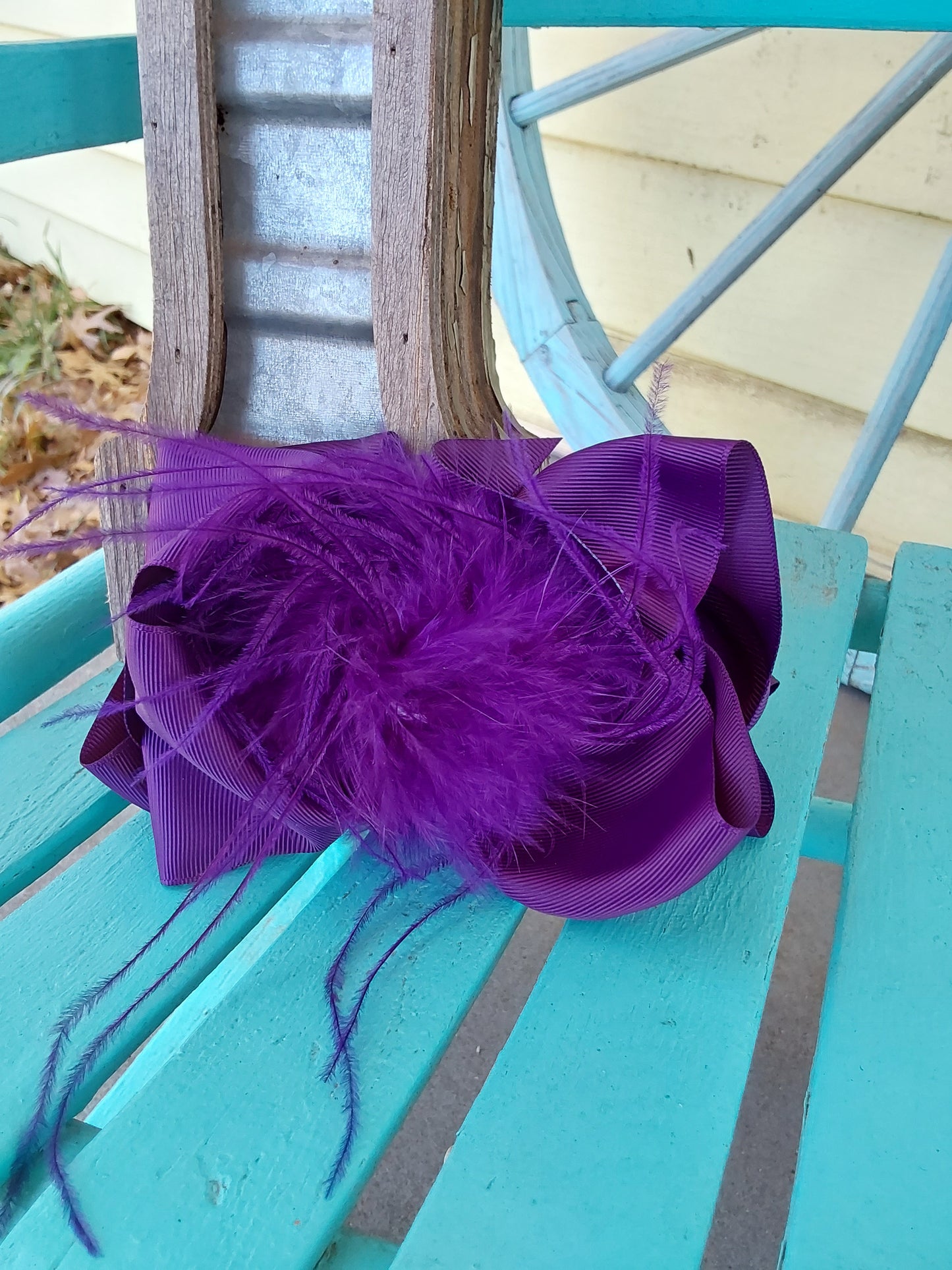 Plum purple feather bow