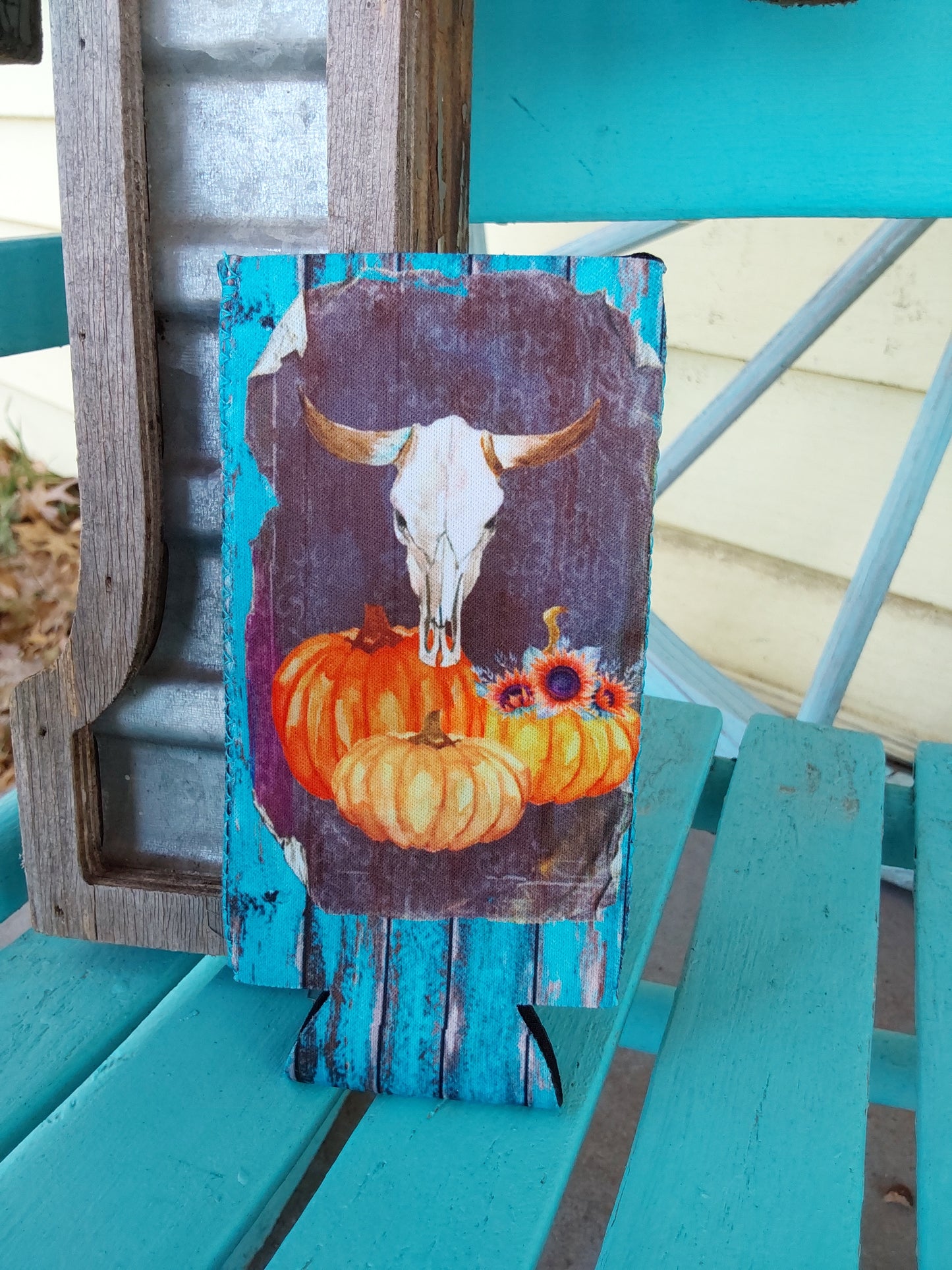 Turquoise pumkin cow slim can koozie