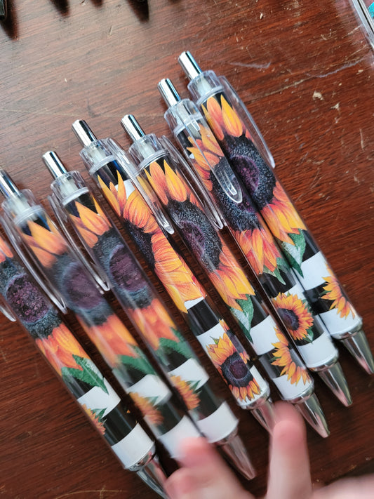 Black and white striped sunflower pens