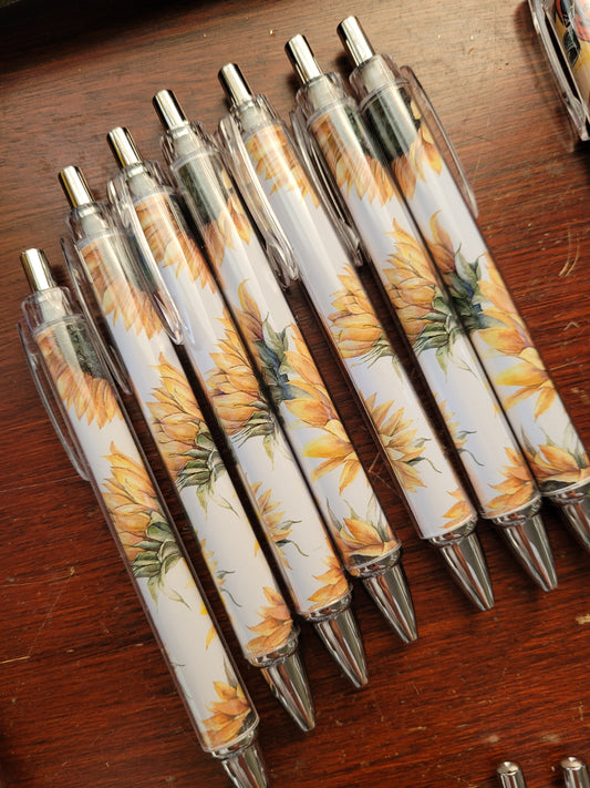 White sunflower pens