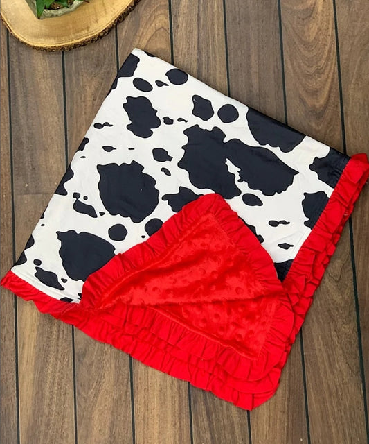 Red cow print blanket